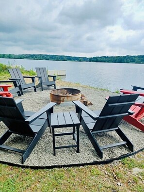 Gather around the firepit with lake views 