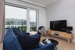The elegant living room perfect for both relaxation and entertainment.