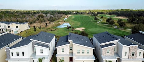 Aerial view of home with golf course at the back