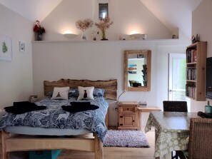 Comfortable double bed to sink into after a day in the mountains 