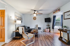 Living area with wall mounted TV