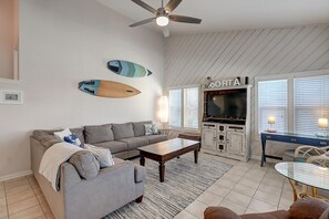 Living room - Upstairs Main Living Room - With Coastal Surfboard flair