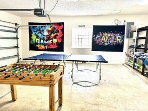 Prepare for battle in the game room.