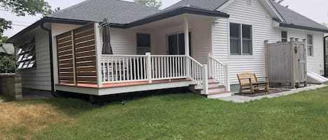 Back of the cottage as seen from Camp Ellis Ave. Driveway is in the back.