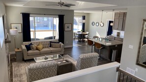 Upstairs Living Room, Dining Area, & Kitchen.