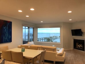 Open floor plan with high end appliances fully stocked kitchen and amazing views