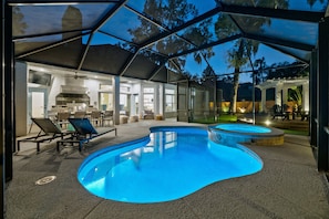 Heated pool and spa, screened in