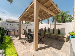 Backyard patio with pergola