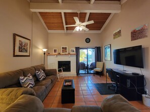 Living Room w/ Vaulted Tongue & Groove Ceiling, New Samsung TV, and Office Space