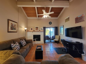 Living Room w/ Vaulted Tongue & Groove Ceiling, New Samsung TV, and Office Space