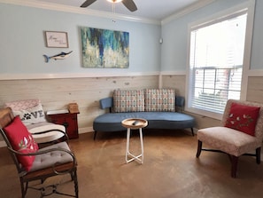 Sit and relax in the living room after a long day at the beach 