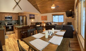 A full view of the upstairs, dining room, living room and kitchen. 