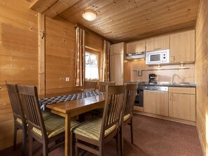 Furniture, Cabinetry, Property, Countertop, Table, Chair, Kitchen Appliance, Wood, Interior Design, Kitchen
