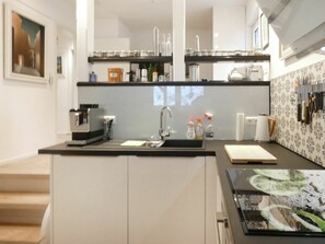 Cabinetry, Countertop, Sink, Kitchen Sink, Tap, Kitchen Stove, Kitchen, Wood, Home Appliance, Lighting