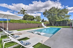 Backyard | Outdoor Pool w/ Slide | Outdoor Seating Area