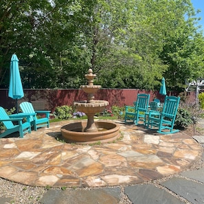Fountain patio for relaxing while you enjoy the lush gardens!