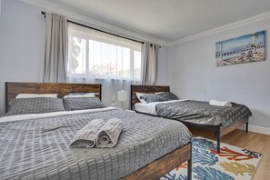 Bedroom one offers two comfortable queen beds