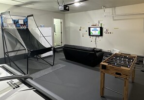 Our air conditioned game room with dual Pop-A-Shot, 30+ Game Nintendo Entertainment System, & Foosball Table.  Air hockey is our favorite!