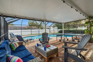 Play Ping Pong or cornhole by the pool. Relax and enjoy the company of friends and family.