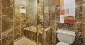 Bathroom with a shower. Basic toiletries and towels are provided
