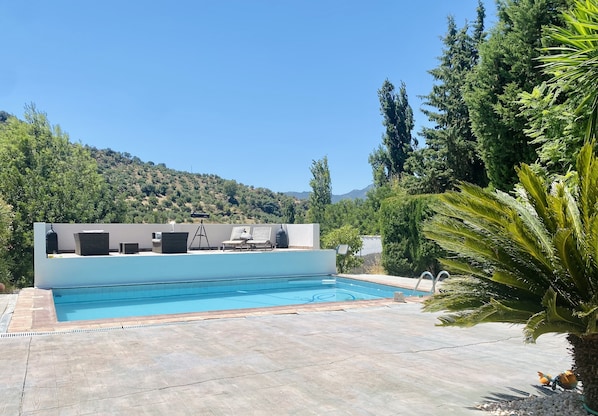 Upper Terrace with sofa and sunloungers