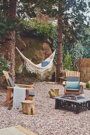 The outdoor seating area and hammock at Hidden Orchard, Cheshire