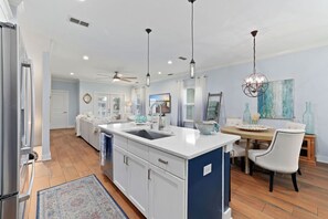 Kitchen, living, dining areas