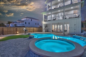 Large hot tub with waterfall 