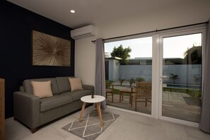 Enjoy watching TV while relaxing in this comfy sofa.