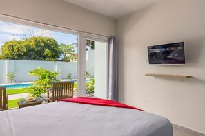From your bedroom you can view the pool area while watching the TV as well.