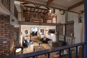 Hill Top Farm, Wensleydale: Views of sitting room with wood burning stove from the balcony