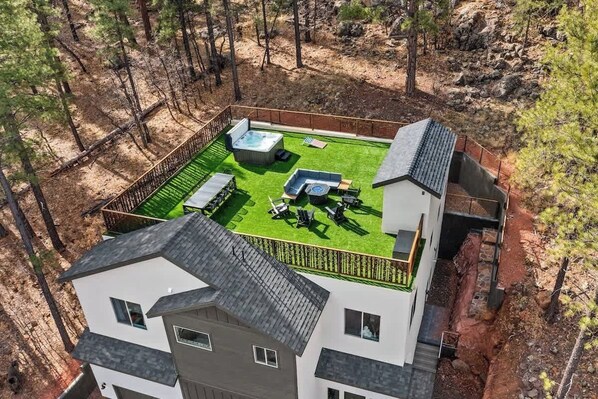 Vacation is calling, and you should come enjoy Flagstaff's only rooftop rental with 360 degree views!