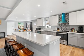 Long kitchen Island with 5 Stools
