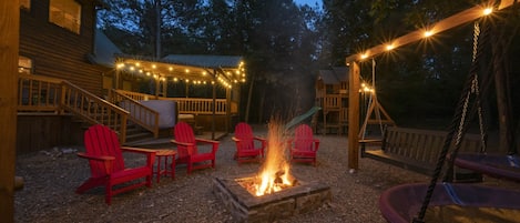 New fire pit and swing.