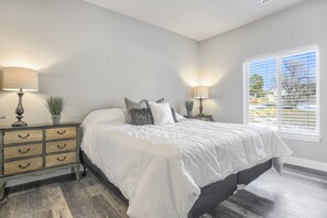 Master Bedroom boasts a king size bed with a full en-suite bathroom!  There is also a Smart TV in the Master so you can enjoy your favorite show from the comfort of your bed!