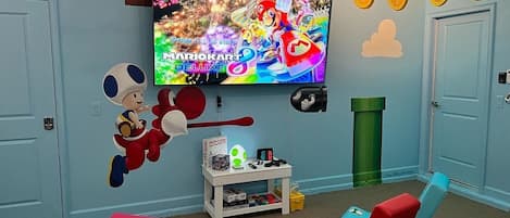 Super Mario: Pop-A-Shot, foosball, ping pong, 85 inch TV, Switch console & more!