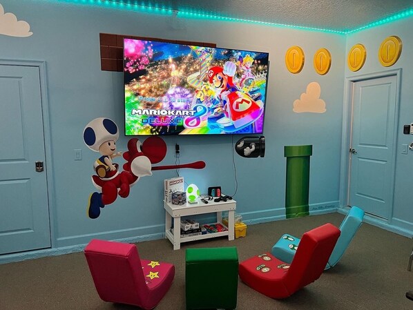 Super Mario: Pop-A-Shot, foosball, ping pong, 85 inch TV, Switch console & more!