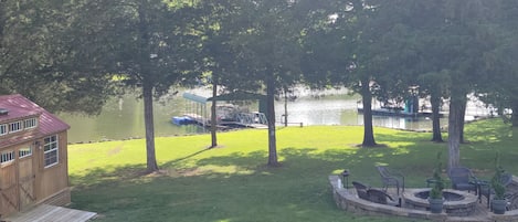 Covered dock with boat mooring. Kayaks available for rent.