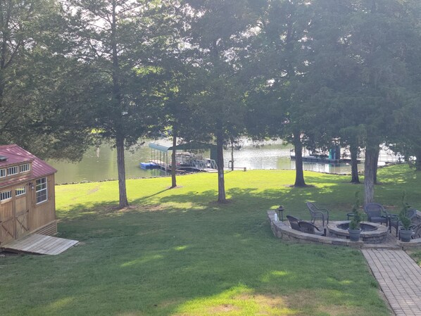 Covered dock with boat mooring. Kayaks available for rent.