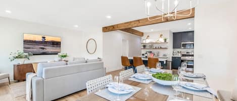 Dining table for six / perfect place to sit after a long day at the beach!