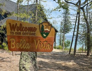 The view pulling up to the cottage.   