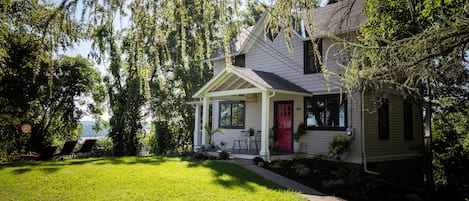 Swan cottage is perched on a hill with gorgeous river views.