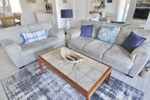 Gather together in comfort. The sofa pulls out into a Queen Size bed, adding space for 2 more.