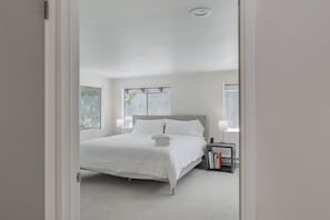 King bed with quality mattress in master bedroom