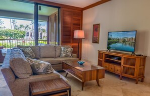 Living Room with large TV, Stereo system, AppleTV and cable TV
