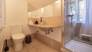 Full bathroom with a very spacious shower and a window! #classical #tile