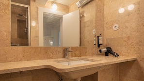 Full bathroom with a shower and a wall heater #modern