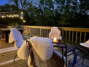Our large upper deck seats 6-8. Enjoy dinner, coffee, BBQ, or stargazing.
