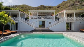 Pool & Terrace: Large terrace surrounding the pool, offering an amazing view of Corossol Harbor and