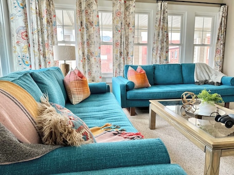 Sit and visit or stretch out and relax on these twin comfy couches.